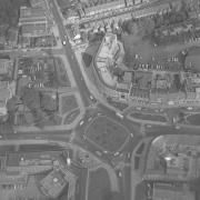 With Hempstead Road to the left and St Albans Road to the top, this was how the Town Hall roundabout looked from above in 1963