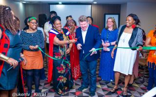 Founder Eva Mbiru (centre left) and MP Dean Russell launched Spiced in Watford – The Cooking Experience last Friday evening.