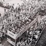 Watford parade through the town on an open-top bus following the final