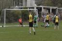 Rifle Volunteer (yellow shirts) score one of their five goals against Old Fullerians. Pictures: Len Kerswill