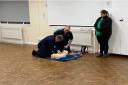 Dean Russell MP learning vital first aid skills