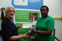 Pinner Association Chairman, Christine Wallace, presenting Harrow Foodbank administrator, Judy Cunningham, with the £1,000 donation from The Pinner Association
