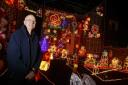 Tony Spicer with his home decorated in lights in 2007. He will turn on the lights this year on December 1.