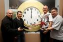 Former Hornets Neil Price, Derek Payne, Ian Bolton and Nigel Callaghan with the Watford Observer clock in the Yellow and Red Lion pub.