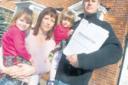 Mr Peers and family with his court summons