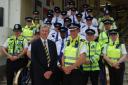 South West Trains chairman Ian Dobbs and BTP Chief Superintendent Steve Morgan, with the teams.