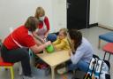 Playskill's therapists in full PPE in new group activity sessions last month