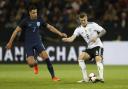Livermore in action for England against Germany's Toni Kroos