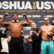 Anthony Joshua and Oleksandr Usyk at today's weigh-in. Picture: PA