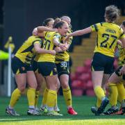 Chiara Meola is mobbed after scoring Watford's goal. Picture: Andrew Waller
