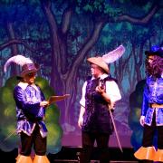 The group performing a previous production of The Three Musketeers.