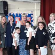 Mrs Bullivant (centre) is retired from Oxhey Wood Primary School after 33 years as a teaching assistant.