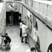 Art students decorating the underpass in May 1976