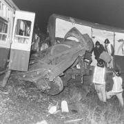 Fire crews at work amid the wreckage of the January 1975 accident