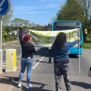 South Oxhey residents temporarily blocked traffic yesterday afternoon in protest.