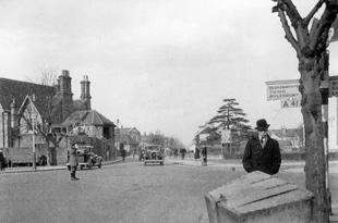 A view of the crossroads at the top of The Parade, shortly before a roundabout was created in 1936 to deal with increasing traffic...