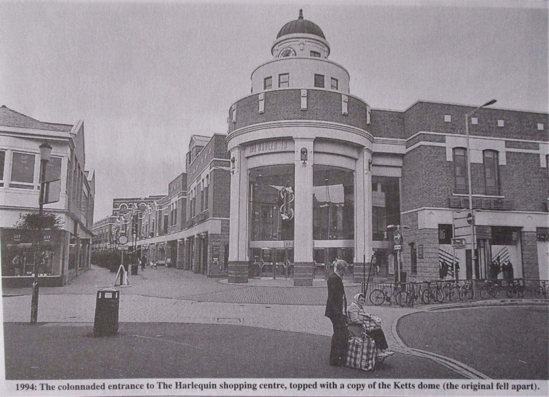 1994: The colonnaded entrance to The Harlequin shopping centre, topped with a copy of the Ketts dome (the original fell apart)