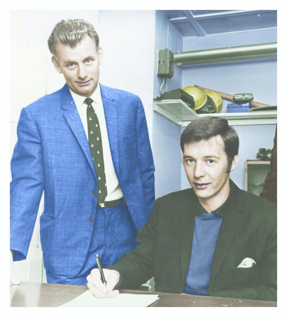 Watford Observer: The Watford manager looks on as Walter Lees puts pen to paper on his contract Watford Observer: The Watford manager looks on as Walter Lees puts pen to paper on his contract