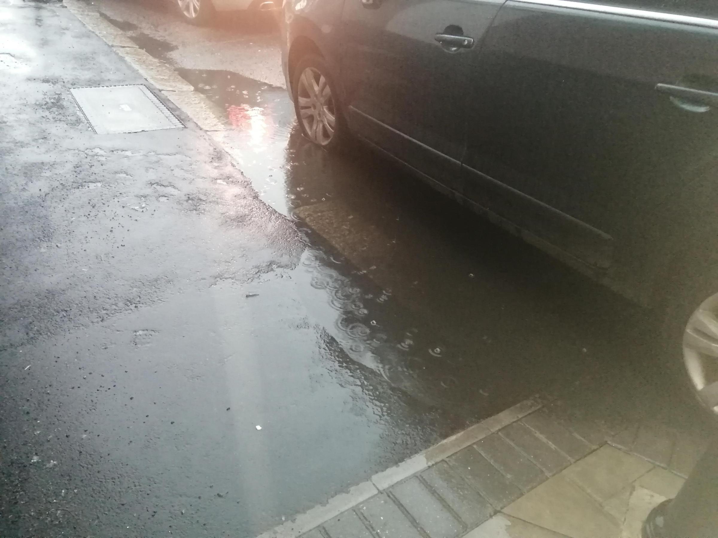 Cllr Khan took this image of water forming on the road within the last week. He says it has only got worse due to recent levels of rainfall