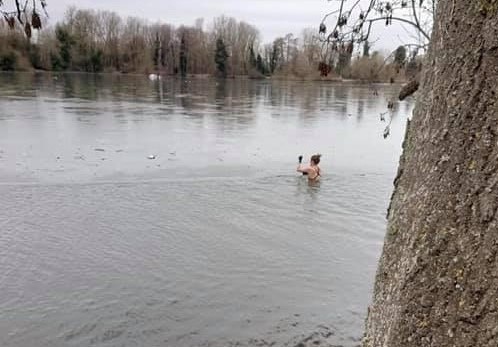 A woman was seen in Rickmansworth Aquadrome, despite freezing conditions (Photo: Facebook)
