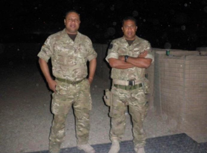 Family handout photo of Ilaitia Cokanasiga (left), the father of England rugby star Joe Cokanasiga, with his brother Mike, at Camp Bastion, Afghanistn in 2011. Credit: PA