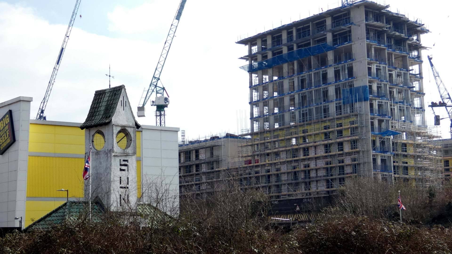 The construction of the 24 storey tower with the Sun Clock Tower, udner threat from demolition, in the foreground. Credit: Lynda Bullock/Watford Observer Camera Club