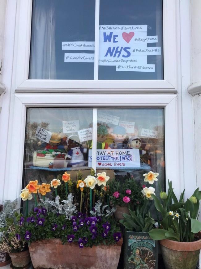 A window display paying tribute to key workers