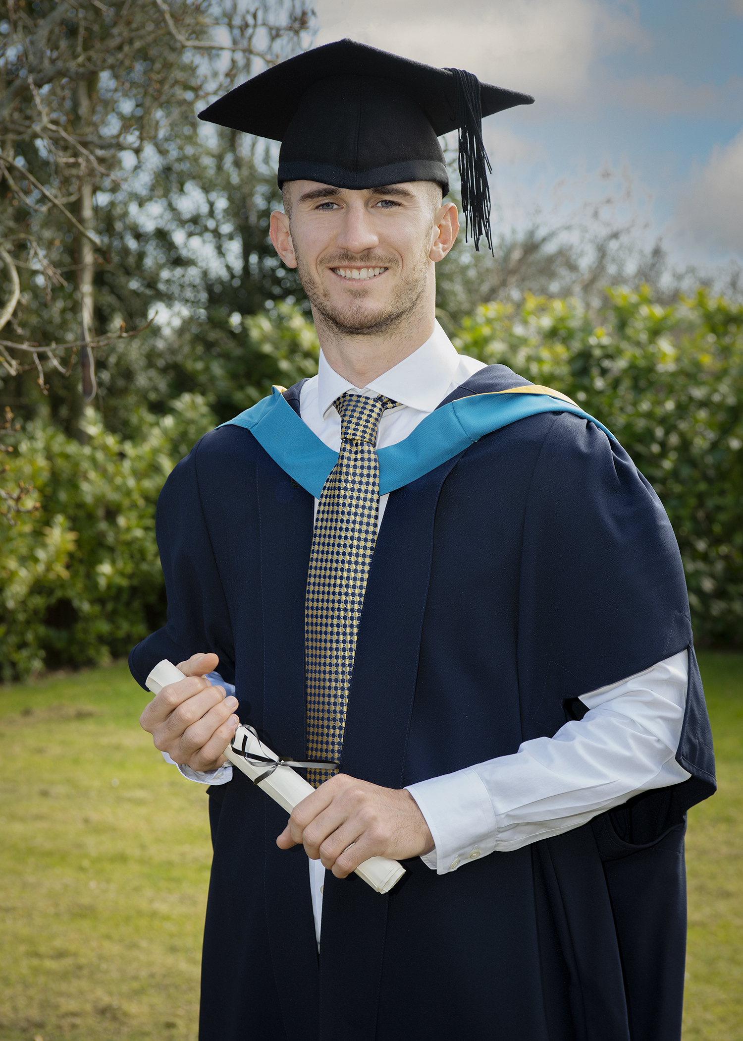 Dominic has graduated from the Open University. Credit: Studio 86 Photography