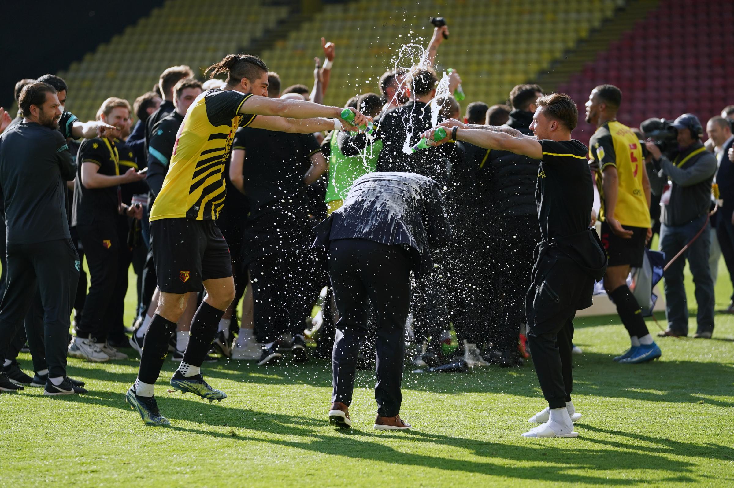 Watford manager Xisco has beer poured over him at the final whistle following their confirmed promotion to the Premier League following their 1-0 win over Millwall at Vicarage Road, Watford. Picture date: Saturday April 24, 2021..