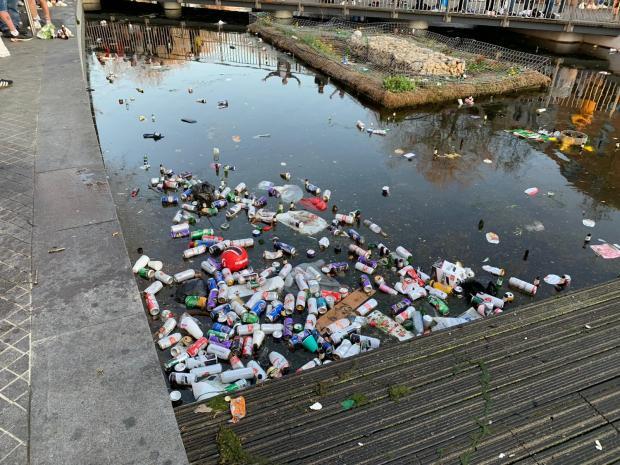 Rubbish accumalted in the pond and the town centre as fans partied for hours. 