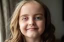 Daisy Passfield, from Abbots Langley, has had a pink sparkly prosthetic eye fitted. Image: SWNS