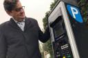Cllr Paul Rainbow, the council’s lead member for transport and economic development, inspects one of the new solar-powered ticketless machines in Rickmansworth.