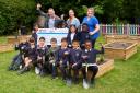 Watford Mayor, Peter Taylor, presented a £5,000 cheque to Beechfield School.