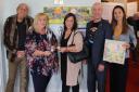 Brian Cowan, Louise Welland, Sumi Watters, Mick Callanan and Aga Dychton in front of Louise's winning collage