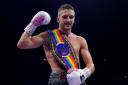 Reece Bellotti celebrates becoming a two-time Commonwealth champion