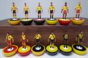 Watford nostalgia in miniature - hand-painted Subbuteo figures showing different kits through the years