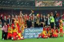 The Watford players and staff celebrate victory at Wembley in 1999.