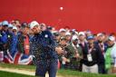 Andy Sullivan chips out of a bunker at Hazeltine during the Ryder Cup. Picture: Action Images