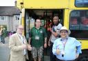 left to right: Cllr Nigel Bell, Norman McGuigan from Minds at War, Luther Blissett, and Cllr Asif Khan at the Big Yellow Battle Bus