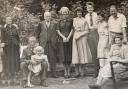 62 Talbot Avenue, Oxhey. L-R, Lesley's grandmother, Agnes Parrish and her grandfather, Reginald; Lesley; Mr. Beasley; Lesley's mother, Peggy. Next but one, Ron Phipps, his mother Bertha, father Harry and grandmother Elsie (Agnes's sister), 1951.
