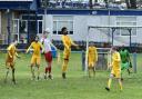 WD Bushey (yellow) safely saw off Everett Rovers in the Challenge Cup after some first-half scares. They are pictured in action against St Josephs the previous weekend.