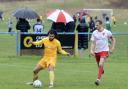 WD Bushey (yellow kit), pictured in action earlier this season, are through to the semi-finals of the Challenge Cup.