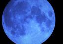 The moon looks blue in this stunning shot