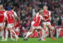 Alessia Russo (right) celebrates scoring Arsenal's final goal in Sunday's 4-1 win over Chelsea
