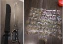 Machetes and a cannabis stash worth more than £20,000 were found in the raid.