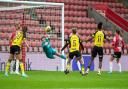 Saints keeper denies Lucia Leon with a superb save early in the game at St Mary's