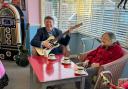Dean Russell, MP for Watford, grabs the guitar to entertain residents at Courtland Lodge Care Home