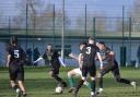 North Watford (black shirts), in action against Evergreen earlier this year, saw their County Senior Cup hopes end on Sunday