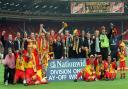 The Watford players and staff celebrate victory at Wembley in 1999.