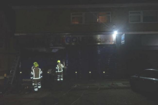 Firefighters outside the shop in Maxwell Road in Northwood. Credit: London Fire Brigade